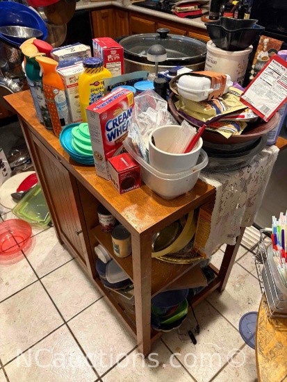 wooden kitchen, island, crockpot, pans, and content