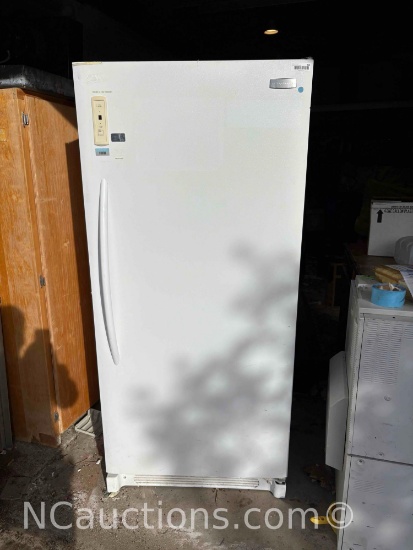 White Frigidaire refrigerator powers on