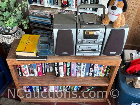 bookshelf books and boombox