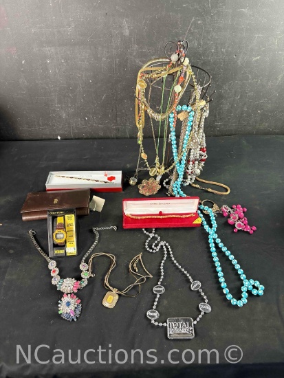 costume jewelry with stand purse, and watch