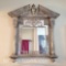 Heavy unique pewter color plaster mirror 64in tall 50in wide.