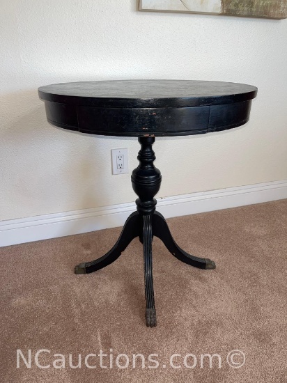 Black decorative end table with hidden drawer