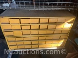Yellow Tool storage drawers for tools and parts with contents