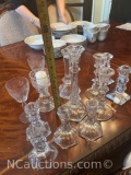 candle holders, glassware, glass dolphin, salt n pep shakers, butter dishes