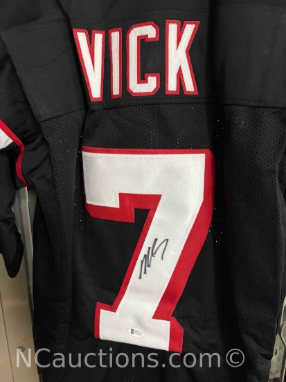 Michael Vick jersey number seven. Tristan Hidden Treasure ID card. signature says Michael Vick