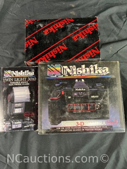 Nishika 35mm 3D camera with twin light 3010 variable angle electronic flash and case