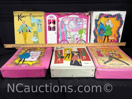 5 Barbie doll cases full of cloths and Barbie doll house