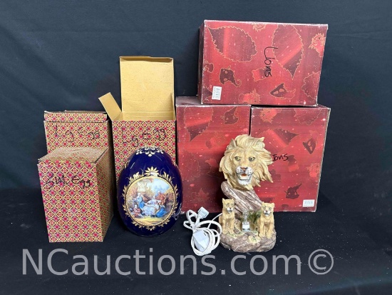 Porcelain eggs and lion pride lamps in original packaging