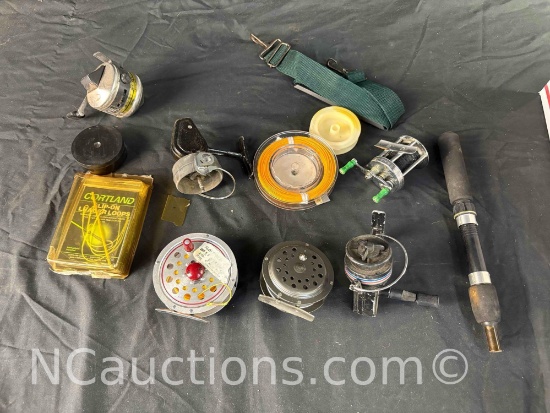 box of Fly Fishing reels