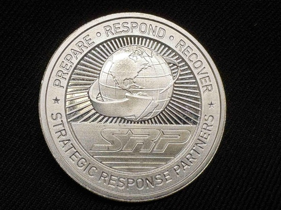 .999 fine silver 31.06 grams strategic response partners, silver round
