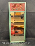 Mirror with Asian carved frame green border with red lacquered scene of a guest entering a house