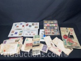 One box of vintage stamps, letters, ephemera, coins, and more