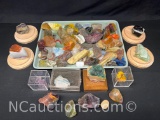 assortment of rough and polished natural gemstones and petrified wood