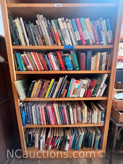 large lot of books on antiques shelving unit not included