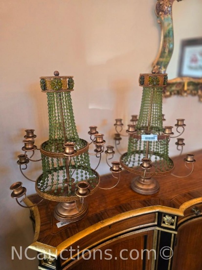 vintage brass Empire-style candelabra adorned with green glass beads.