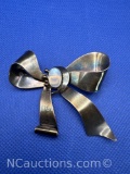 Sterling Silver Moonstone Bow Pendant 17 Grams