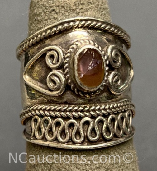 sterling silver 925 wide band ring 6 grams and a central pink stone