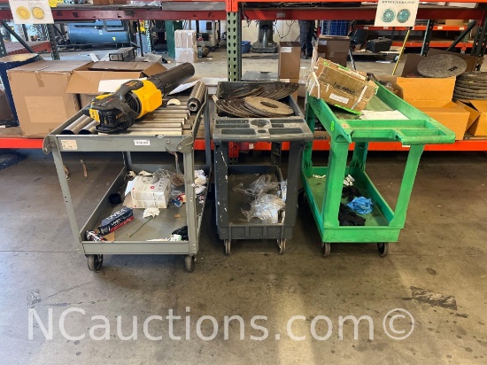 Estimated Three push work carts contents not included