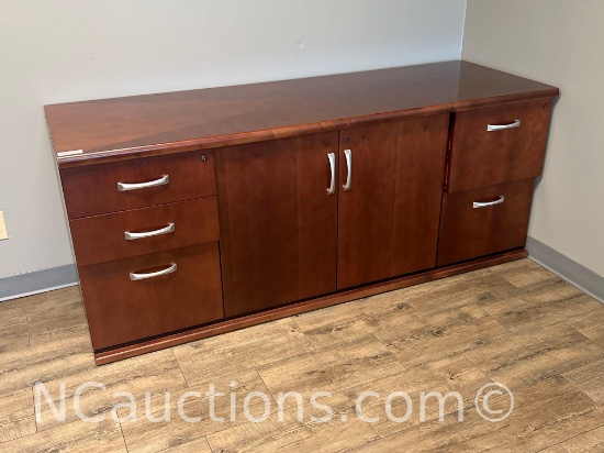 Wooden office credenza featuring a warm cherry-colored finish upstairs