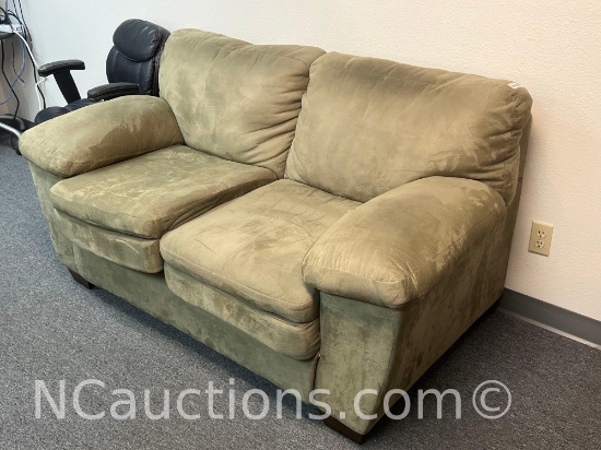 Olive-green microfiber loveseat