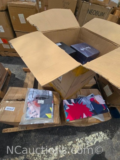 Pallet of Oversized Mousepads and New Age Skull Spine and Candles