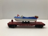 Lionel Red Flatcar with Blue and White Boat 6804