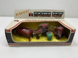 International Farm Set, Ertl, includes tractor, round baler with bale of hay, and wagon, 1/64 Scale,