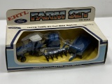 Ford Farm Set, Ertl, includes tractor, round baler with hay, and 6 bottom plow, 1/64 Scale