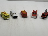 Assortment of Hot Wheel firemen cars. 3-Fire Trucks,1- Emergency fire truck and 1 white fire truck S