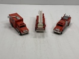 Assortment of Fire Trucks.1- Road Champs fire truck, 1- Road Champs Rescue squad and 1- Welly Fire T