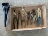 Assortment Of Pliers, Wire Stripper, And A Funnel