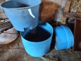 Three Blue Plastic Water Tanks