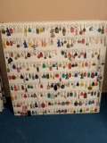 Assorted Lot of Keychains on Both Sides of Board