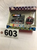 2001 NASCAR Dale Earnhardt dated collectible with NASCAR helmet ornament set