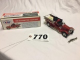 ERTL 1926 Seagrave firetruck diecast metal bank with box and key. Broken front bumper, is included