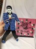 Lot of 2- Elvis Presley hanging wall clock with swinging hips and Las Vegas dice standing clock