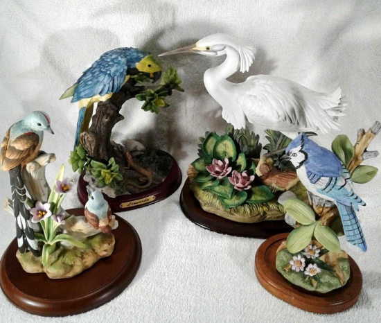 4 Assorted Porcelain Birds with Wooden Stands