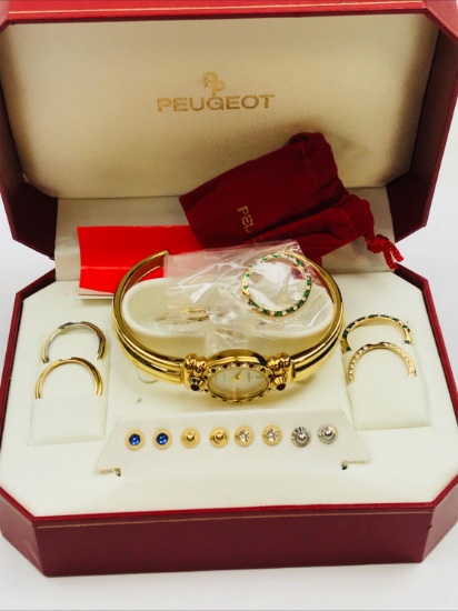 Ladies Peugeot Gold Watch with 7 Interchangeable Bezels