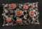 Silver Toned Filigree Brooch With Red Stones