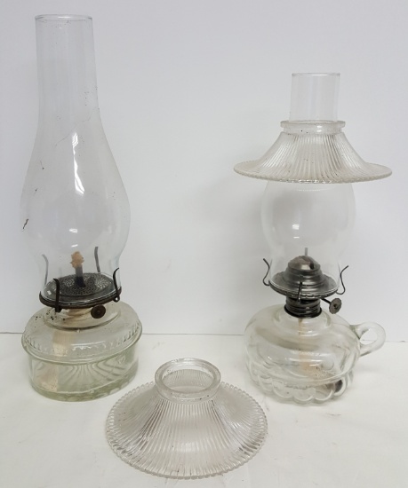 2 Vintage Oil Lamps - 1 has finger loop and glass deflectors. 12" & 14".