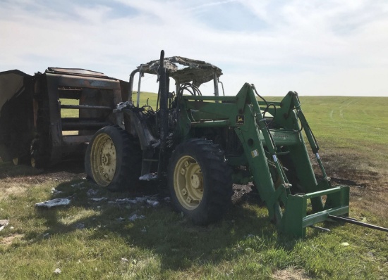Insurance Claim: 1992 John Deere 6400 Tractor