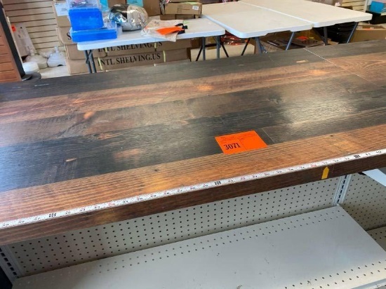 Counter with shelves on both sides. 29" deep, 98" wide, 37" tall. 10 shelve total including bottom
