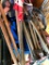 Several Leaf Rakes Cooking Pot Folding Chair 2 Saw Horses