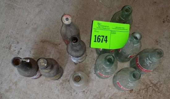Lot of glass soda bottles, coke and other