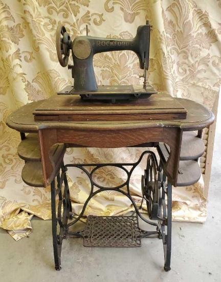 Antique Rockford sewing machine with cabinet and foot pedal