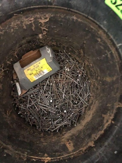 Bucket with nails