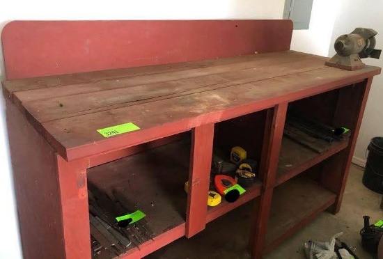 6ft long, 2ft wide, 42 inches tall work bench with grinder