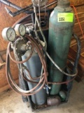 Torch with bottles and cart