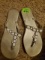 flat silver or pewter flip flops with white beads