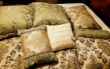 Queen comforter and throw pillows.